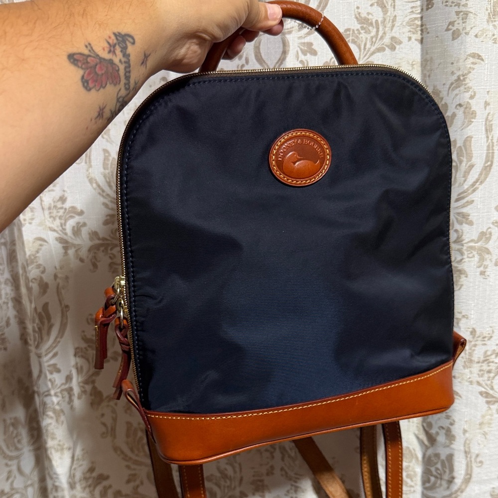 SOLD . Dooney & Bourke Navy Nylon Backpack with Brown Leather Trim